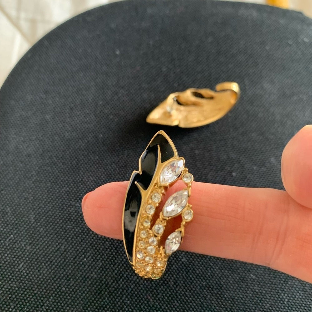 Gold black and fake diamond pierced ear earrings.